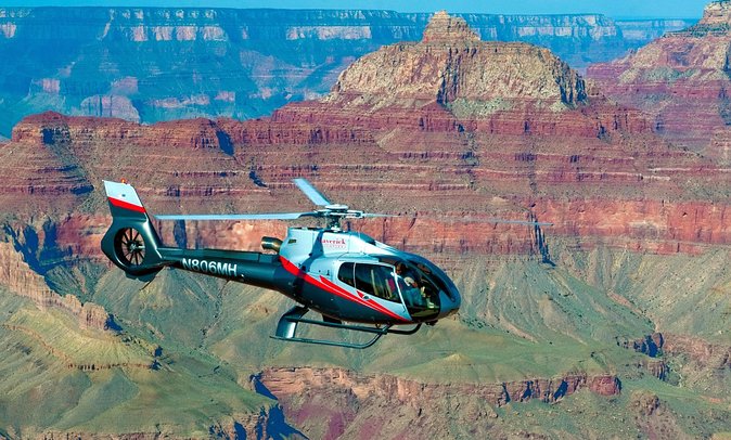 45-minute Helicopter Flight Over the Grand Canyon from Tusayan, Arizona - Crossing Kaibab National Forest toward the canyon