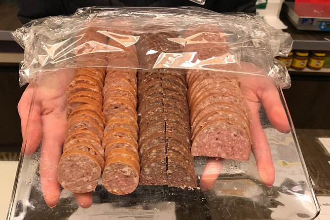 Anchorage City Tour w/ Taste of Wild Smoked Salmon & Reindeer Sausage - Alaska Wild Berry Products and the famous chocolate waterfall