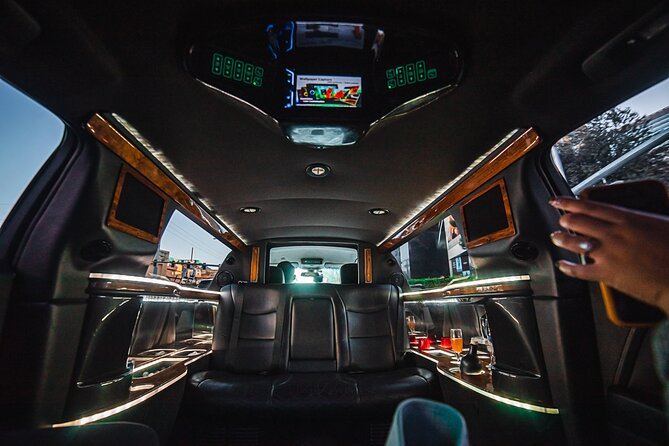 Arrival Transfer: Private Luxury 8 Passenger Limousine Service - Luggage, children, and access details