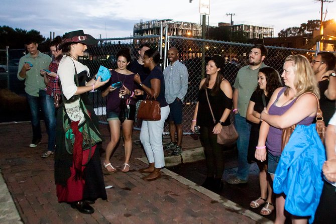 Charleston Haunted Booze and Boos Ghost Walking Tour - Charleston City Market between the bars