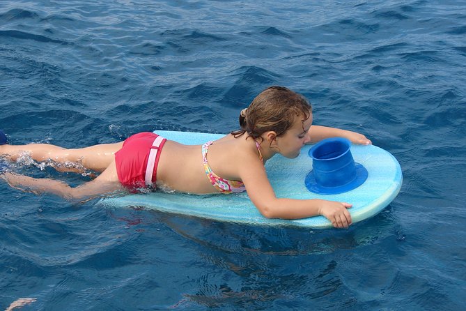 Deluxe Snorkel & Dolphin Watch Aboard a Luxury Catamaran from Kailua-Kona - How the $183.77 Price Measures Up