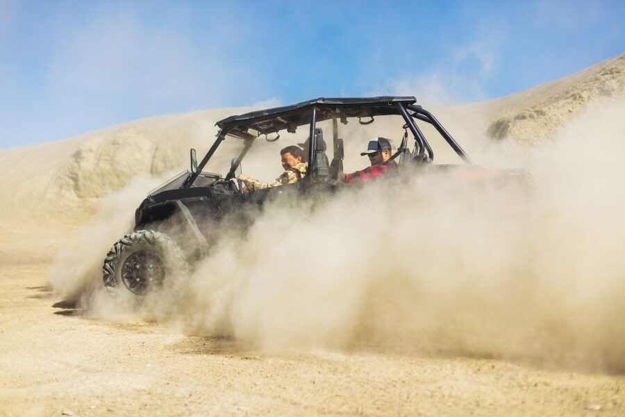 East Zion: Crimson Slot Canyon Exploration and UTV Tour - Entering the 100-foot crimson walls