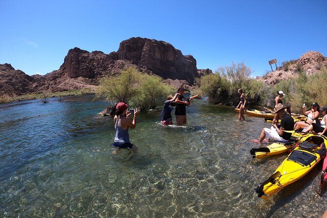 Emerald Cave Express Kayak Tour with Scenic & Historic Stops - Beach time, snacks, and the cold-water reality