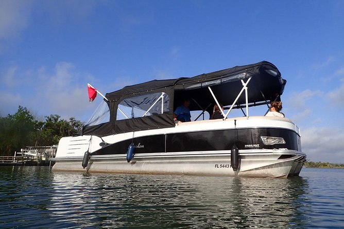 Exclusive Small Group VIP Heated Manatee Snorkel Tour - The covered pontoon ride into the refuge