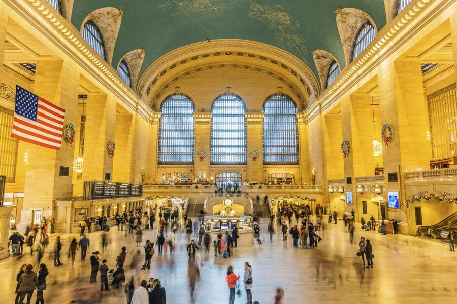 From Manhattan: Bronx, Queens and Brooklyn Half-Day Tour - Crossing Grand Central Bridge toward the Upper East Side