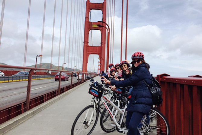 Golden Gate Bridge Guided Bicycle or E-Bike Tour from San Francisco to Sausalito - Fort Point explains the bridge’s unusual shape