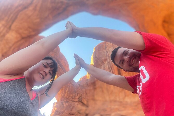 HIGHLY RATED Arches National Park Sightseeing Tour From Moab Utah - Lower Delicate Arch Viewpoint: the famous arch from a distance