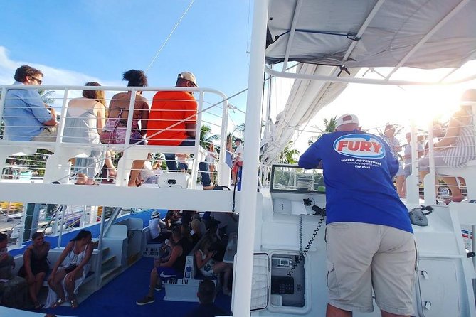 Key West Sunset Sail with Live Music, Drinks and Appetizers - Following the Key West shoreline at sunset
