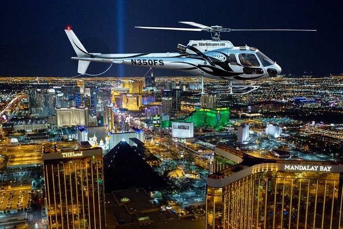 Las Vegas Helicopter Night Strip Flight Tour with Optional Dinner - The Sphere, Bellagio, and Luxor beam