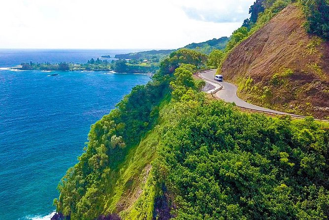 Maui: Famous Road to Hana Waterfalls and Lunch by Mercedes Van - Hana Bay and the road’s rural finish
