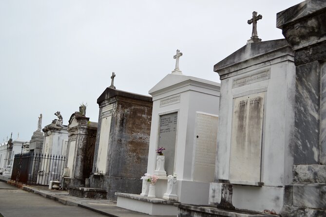 New Orleans Cemetery Bus Tour with Exclusive Cemetery Access - Testing EMF readers among the tombs