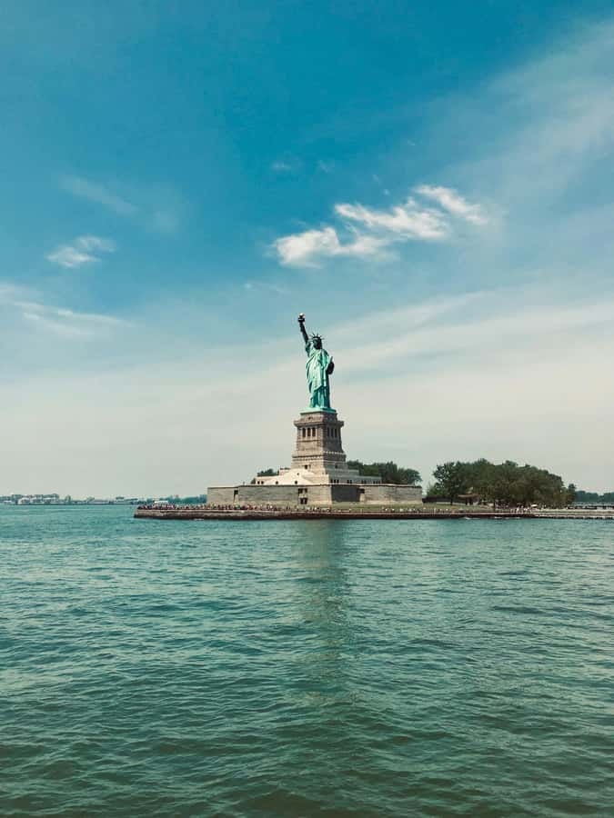 New York City: Statue of Liberty & Ellis Island Guided Tour - Liberty Island and the first view of Lady Liberty