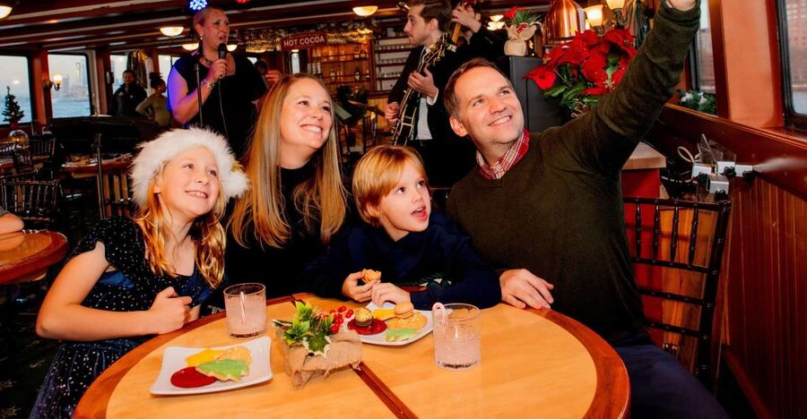 NYC: Holiday Yacht Cruise with Jazz, Cocoa & Carols - The Statue of Liberty moment