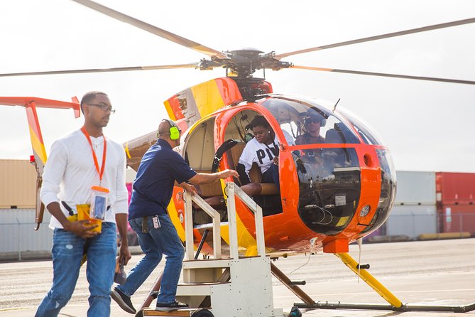 Oahu: Magnum PI Hughes 500 4-Passenger Doors-Off Helicopters - Leaving Honolulu with Pearl Harbor below