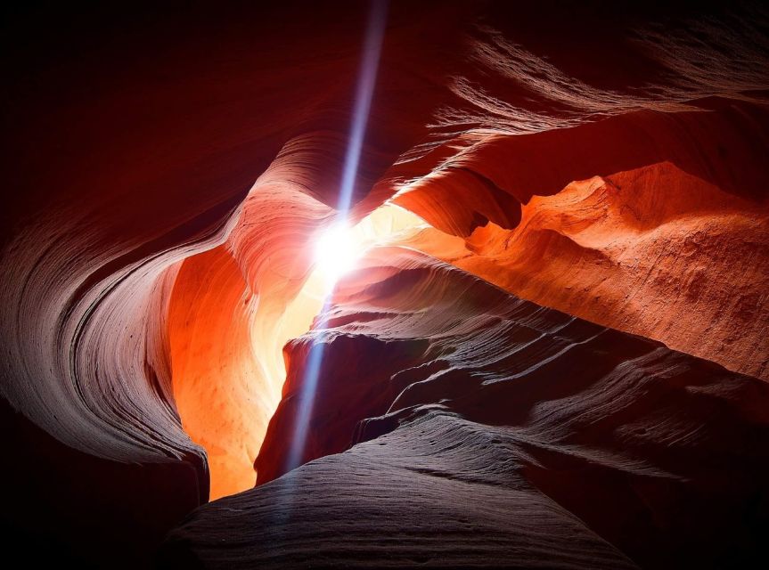 Page: Upper Antelope Canyon Prime Time Entry & Navajo Guide. - The enclosed van ride across the sand