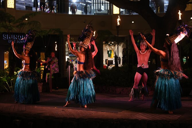 Queens Waikiki Luau with Dinner Buffet and Cultural Activities - The mall setting is the central trade-off