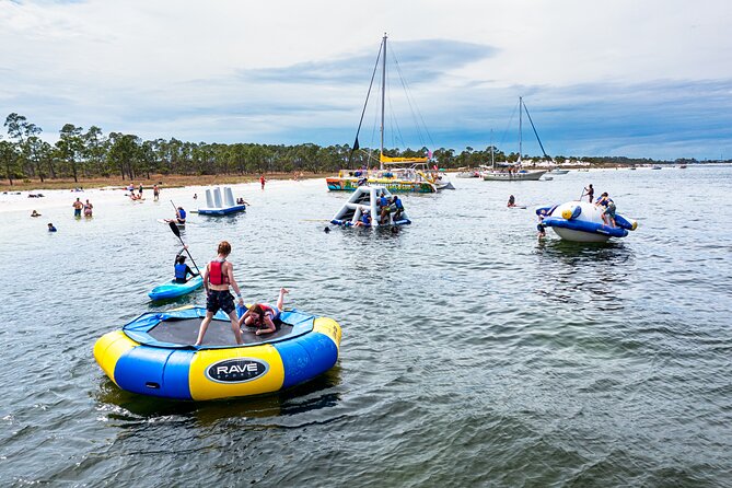 Shell Island Inflatable Adventure Park & Dolphin Sightseeing Tour - What the crew adds to the day