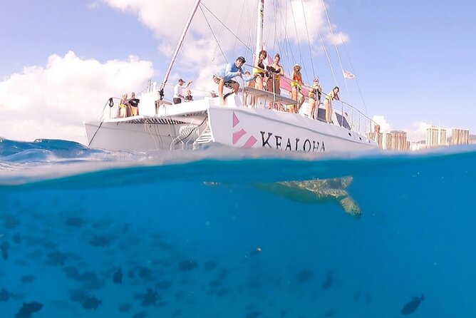 Sunset Boat Cruise: Swim and Cruise Waikiki - Crew, Music, Snacks, and Drinks