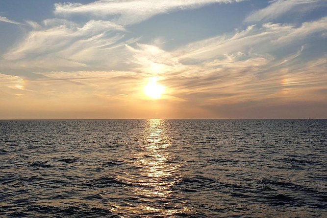 Sunset Celebration Cruise on Tropics Boat Tours - The sunset from the open Gulf