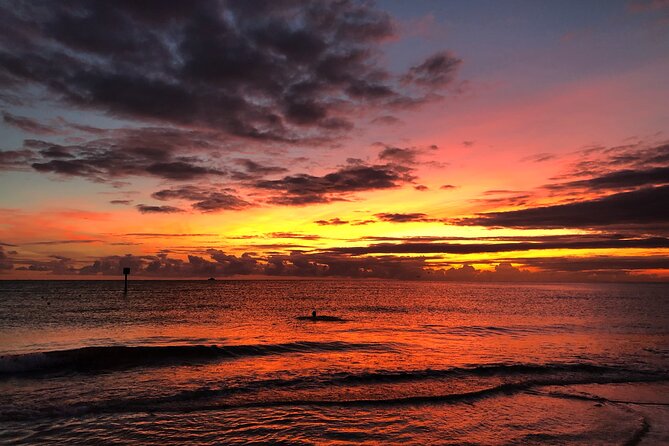 Sunset Celebration Cruise on Tropics Boat Tours - The ride out: commentary, music, and changing views