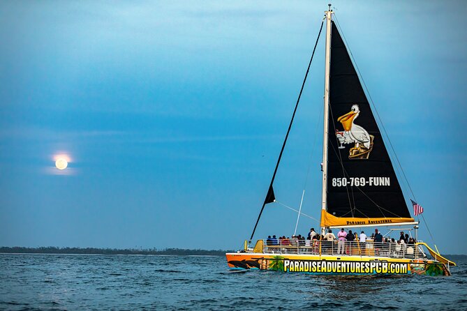 Sunset Dolphin Sail Aboard the Privateer Catamaran - A steady start on the 52-foot Privateer