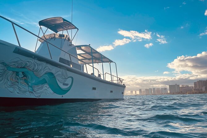 Turtle Canyon Snorkel Adventure in Waikiki, Oahu - Diamond Head and the Waikiki coast from the water
